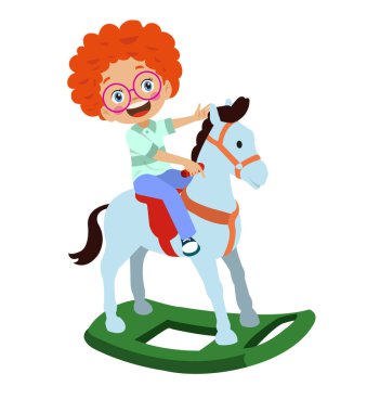 Oyuncak atın üstünde sallanan mutlu çocuk