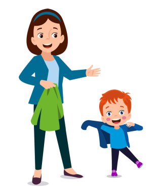 Annesiyle birlikte giyinen sevimli çocuk.