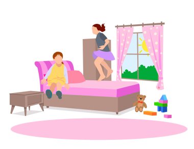 Yatak odasında oynayan sevimli çocuklar.