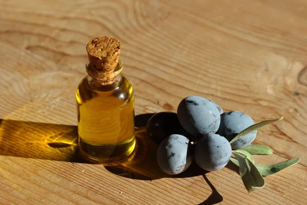 Olive Oil Bottle Black Olives Wooden Table — Stock Photo, Image