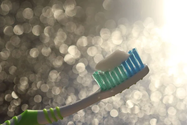 Toothbrush Toothpaste Isolated Bokeh Background Nylon Bristles Plastic Handles Blank — Stock Photo, Image
