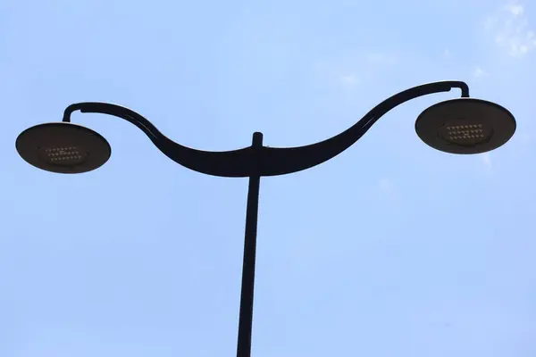 stock image street lamp on blue sky