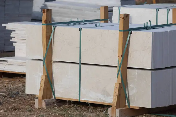 stock image stack of marble slabs in warehouse