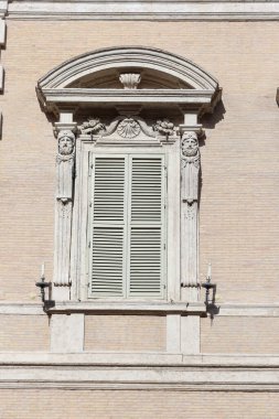Old Window with Shutter on a Roman Historical Building
