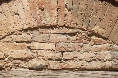 İtalya 'nın Siena kentindeki tuğla duvar dokusunu ve tarihi yapıyı kapatın