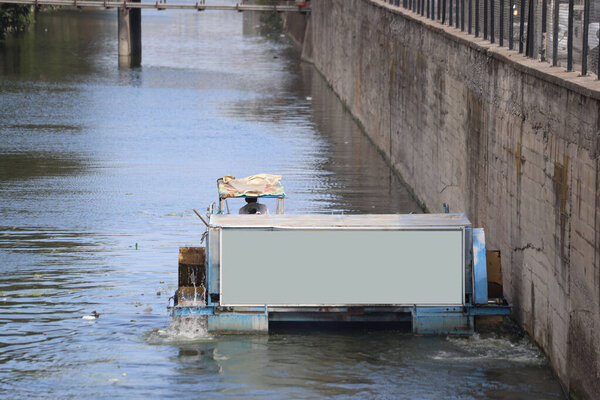 Municipal Crew Operating Canal Cleaning Machine