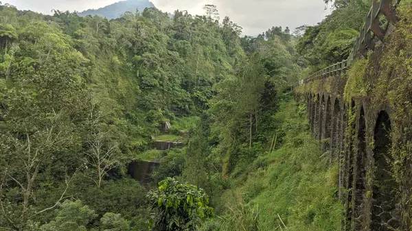 stock image Plunyon Bridge which is over the Kalikuning river with beautiful and amazing views is located on the southern slopes of Mount Merapi.