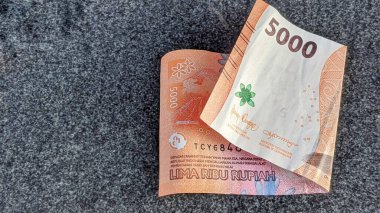 5000 rupia değerinde Endonezya parası.
