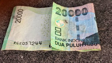 20.000 rupia değerinde Endonezya parası.