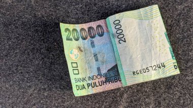 20.000 rupia değerinde Endonezya parası.