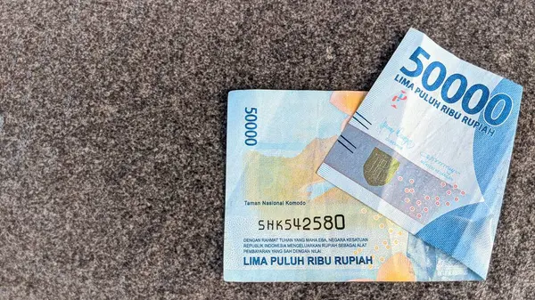 stock image Indonesian currency denominated in 50000 rupiah or 50k rupiah.