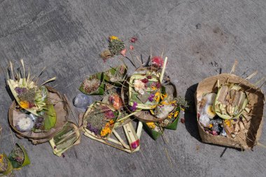 Canang Sari has dried up because of the hot sun. Flat lay or top view.