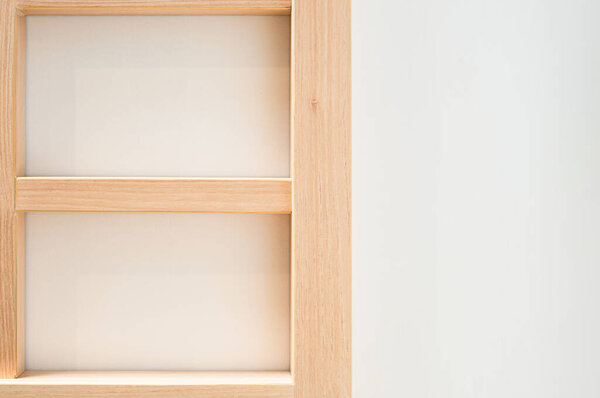 Wooden vintage Japanese style traditional sliding door on white wall as background