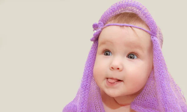 Stock image Little beautiful girl smiles beautifully. Portrait of a happy girl. Newborn baby close-up.