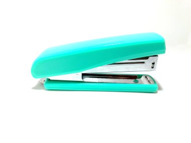 A modern and elegant office stapler isolated on a white surface. A stylish and contemporary office stapler captured on a white backdrop. This premium image is ideal for various professional and business-oriented purposes, clipart