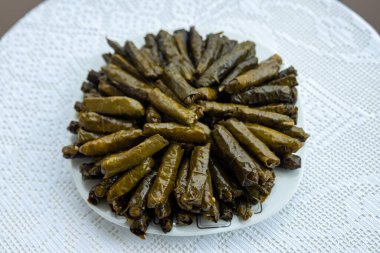 Traditional delicious Turkish foods , stuffed leaves ,traditional turkish dish made from rice wrapped in grape leaves. High quality photo