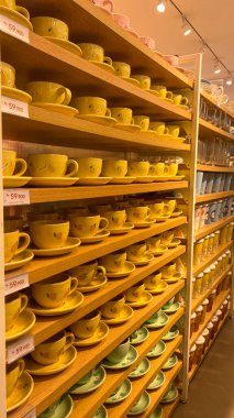 shelves with different types of products in supermarket