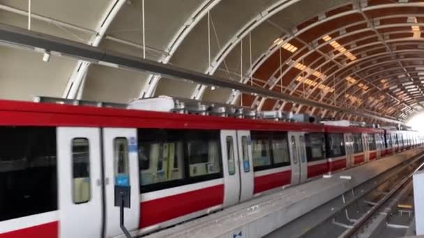 Lrt Train Leaving Dukuh Atas Train Station — Stock Video