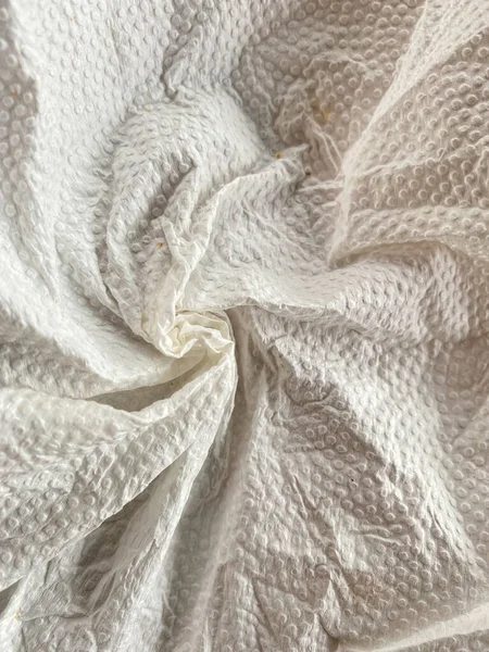 Beyaz renk katlanmış kağıt doku arka plan dokusu, buruşmuş kağıt doku dokusu. Üst görünüm boş kağıt grunge ezilmiş kağıt dokusu ışık ve gölge kopyalama alanı