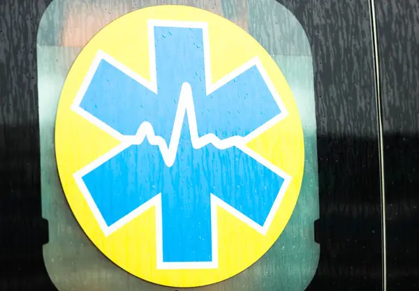 Emblem of the Emergency Medical Service on an ambulance