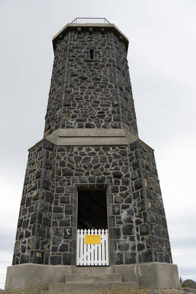 The monument at the top of Puketapu hill near Palmerston, New Zealand. The public memorial to Sir John McKenzie, replacing an earlier cairn, on Puketapu. There is a walking track to hike to the top of this hill. 
