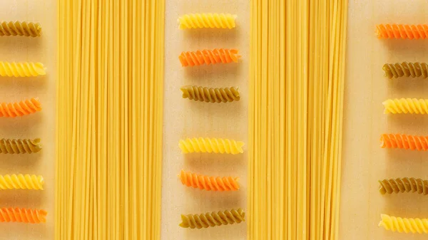 Italian raw pasta, different types and shapes of pasta. Italian food culinary concept. Flat lay