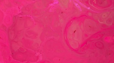 Pembe renkli mürekkep hareketleri. Soyut pembe arka plan görüntüleri. Sıvı boya efekti arka planı