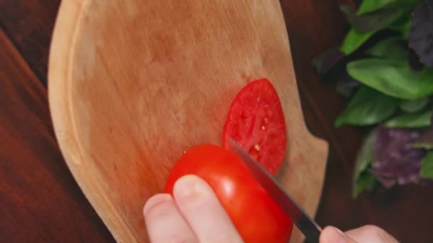 Man Slicing Red Tomato Wooden Board Process Cutting Preparation Food — Stock Video