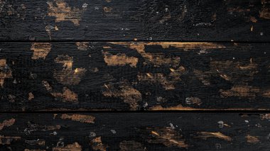 Eski koyu renkli ahşap yüzey: rustik cazibeyle çizilmiş ahşap tahta