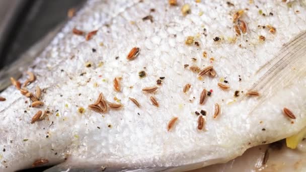 Raw Stuffed Dorado Fish Sprinkled Cumin Seeds Macro Shot — Stock Video