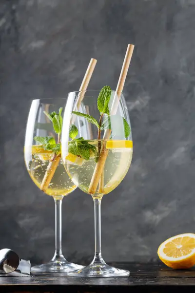 stock image Trendy Elderflower Hugo Spritz Cocktail with Lemon Slice and Mint