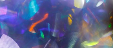 Mor, Sarı, Mavi ve Pembe tonlarda Yumuşak Bulanık Şekillerle Soyut Renkli Işık Yansımaları