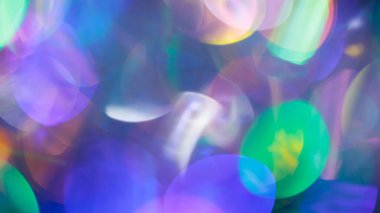 Ayrışmış Küresel Işıklar ve Parlayan Gradyan ile Çok Renkli Soyut Arkaplan
