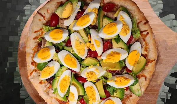 delicious fresh baked pizza on table, eggs pizza