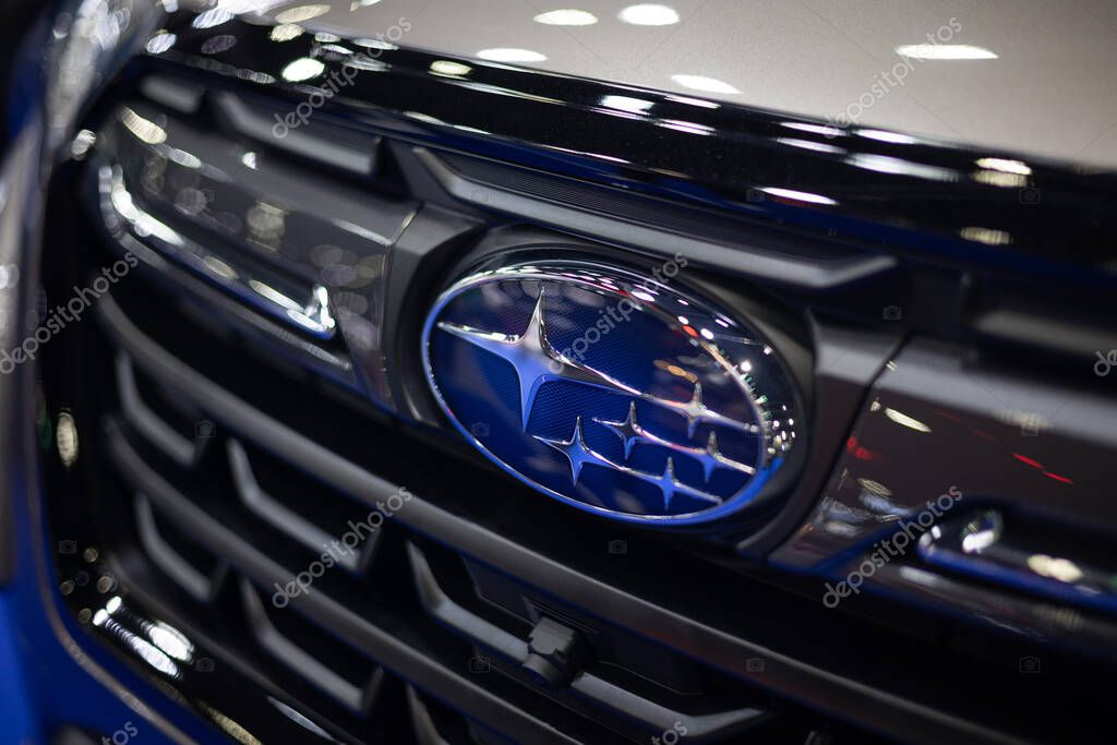 Bangkok,THAILAND - March 30 2023: Closeup Subaru brand logo at Subaru Forester car from Subaru Corporation or Fuji Heavy Industries  Japan.