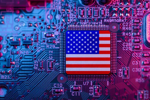 US flag on Computer Chips for Chip War Concept. USA Global chipmakers. Microchip on Motherboard with America world largest chip manufacturer and supply chain concept.