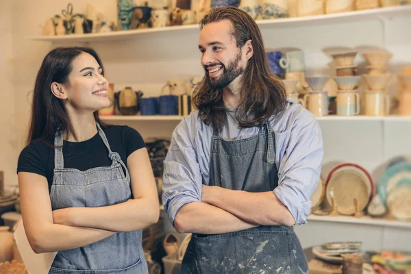 stock image happy young business owner couple friends lover with pottery ceramic shop store