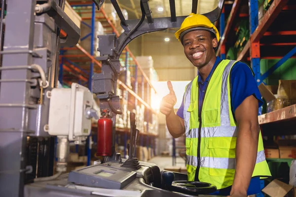 African black people worker happy working control forklift cargo loading in warehouse inventory logistics industry employee staff