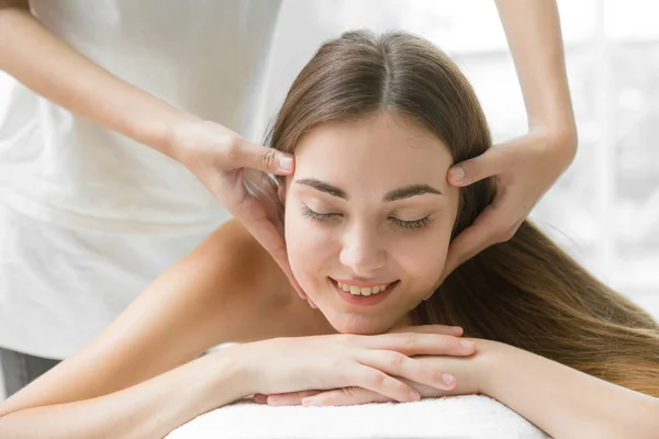 health care beauty women head massage in spa pain relief relax for healthy lifestyle. beautiful lady body care treatment closeup facial.