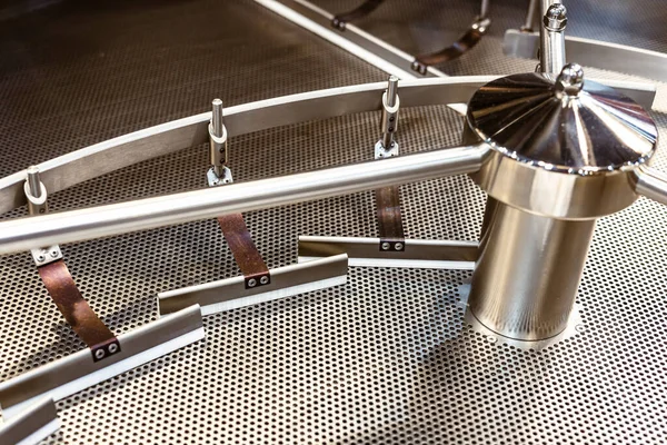 closeup cooling tray stainless steel part of industry coffee roaster machine