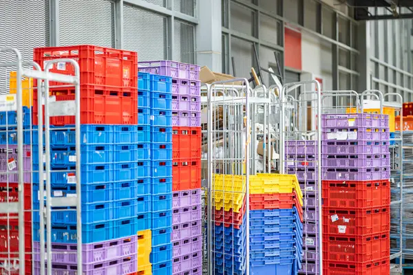 Plastic Crates Stacked behind food grocery retail store for supply chain products shipping distribution and business market consumption concept.
