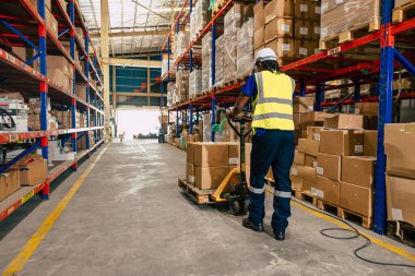 african black warehouse worker using parcel pallet moving cargo for logistics shipping supply management industry clipart