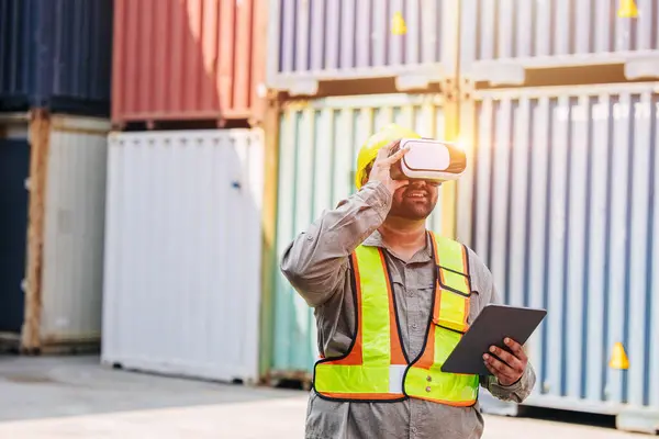 stock image Worker Using VR Vision Pro Technology Equipment Headset Device Work at Container Yard Construction site Innovation in Logistics Industry