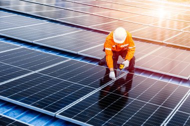 Professional Engineer Service Solar Panel. Worker Maintenance Cleaning Replacing Solar Panel. Solar photovoltaic panel system in Industry roof. Saving Energy with Clean Power. clipart