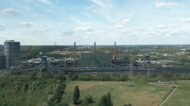 Bottrop bölgesindeki ArcelorMittal 'ın kokain fabrikası toplam 146 fırına sahip üç bataryadan oluşuyor ve yaklaşık iki milyon ton kokain üretimi için tasarlanıyor..