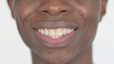 Close Up of Smiling Casual African Man Lips