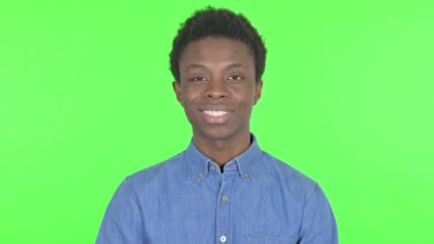 Approval Casual African Man Shaking Head Green Background — Stockvideo