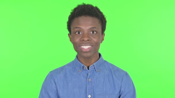 Successful Casual African Man Celebrating Green Background — Stockvideo