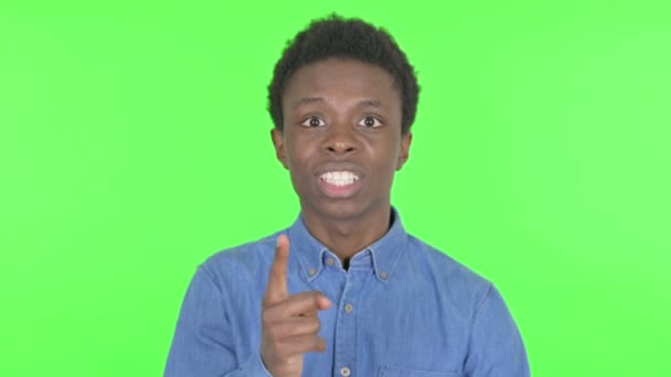 Angry Casual African Man Arguing Green Background — Video