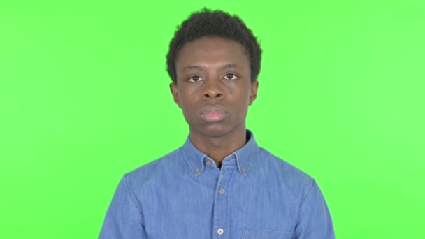 Casual African Man Looking Searching Green Background — Stock video